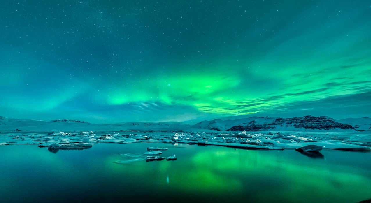 Die Gletscherlagune mit Nordlicht, welche während der Nordlicht-Fotoreise fotografiert wurde